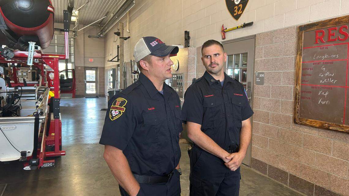 Luke Wiebe, left, and Tyler Brenneman, right, answer questions from media on Oct. 14 at Fire Station 32. Wiebe and Brenneman were part of a task force sent to North Carolina to assist with relief efforts after Hurricane Helene.
