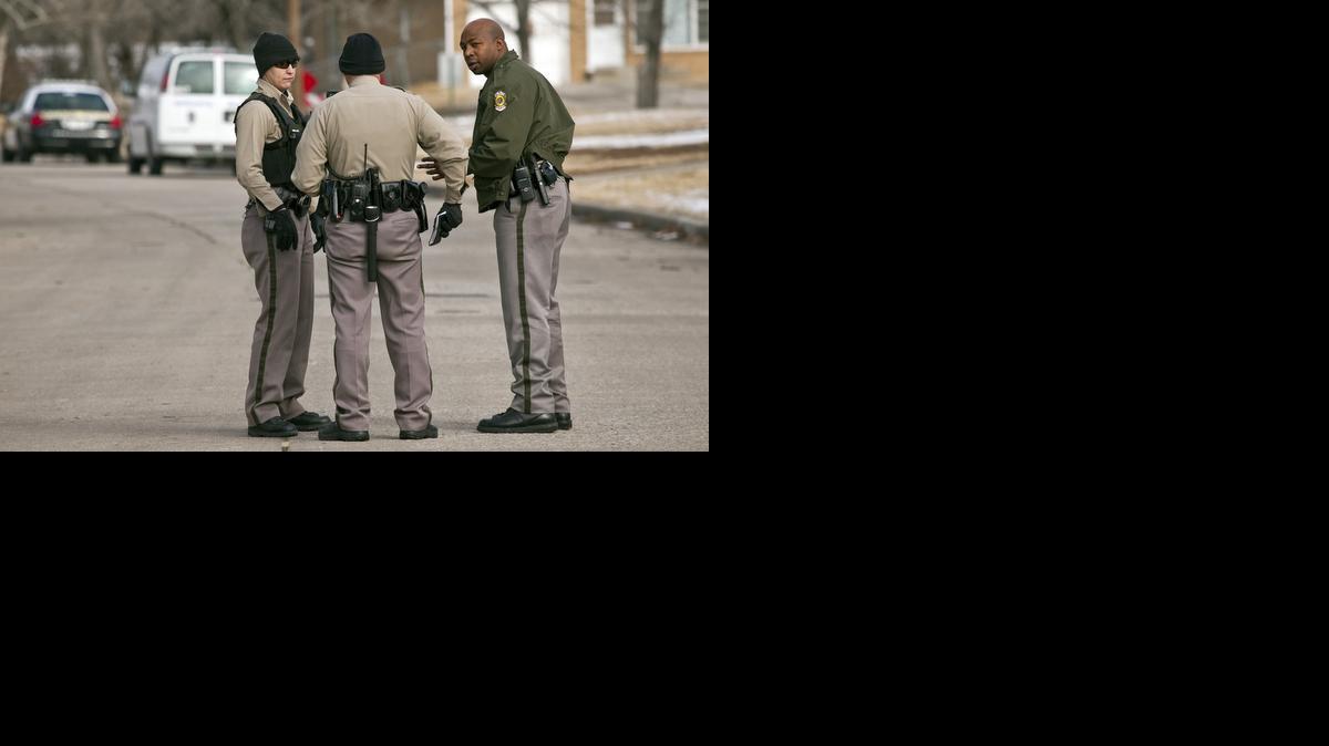 Wichita police investigate the scene of a shooting in the 1700 block of Northeast Parkway on Jan. 3, 2013. The victim drove himself to the QuikTrip at 13th and Oliver on Jan. 2 and told a customer he had been shot. The man was taken to Wesley Medical Center, where he later died.

