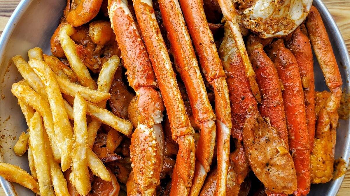 Seafood boils, where veggies and seafood are cooked together in one pot, are the specialty at Hook & Reel, which opens Monday in Wichita.