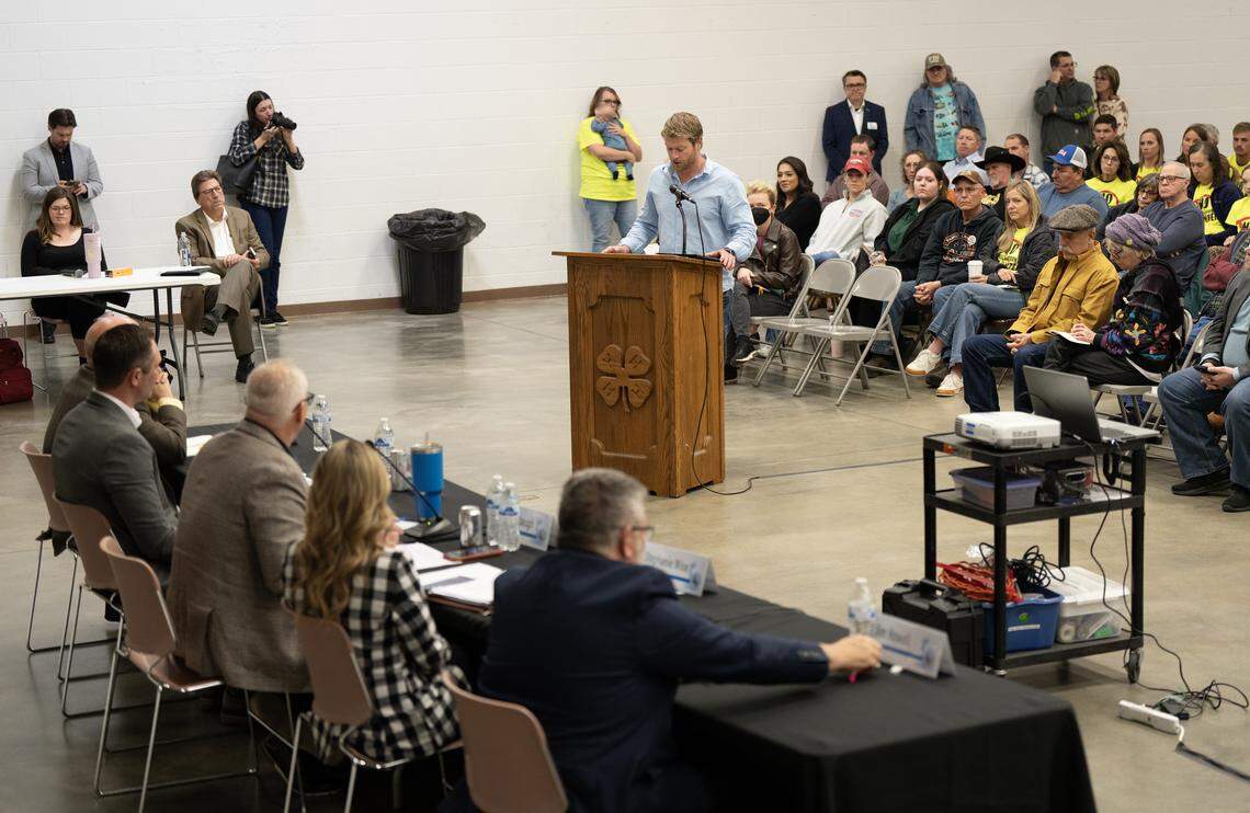 Andale resident Jordan Ungles addresses Sedgwick County commissioners during town hall on data centers Thursday.