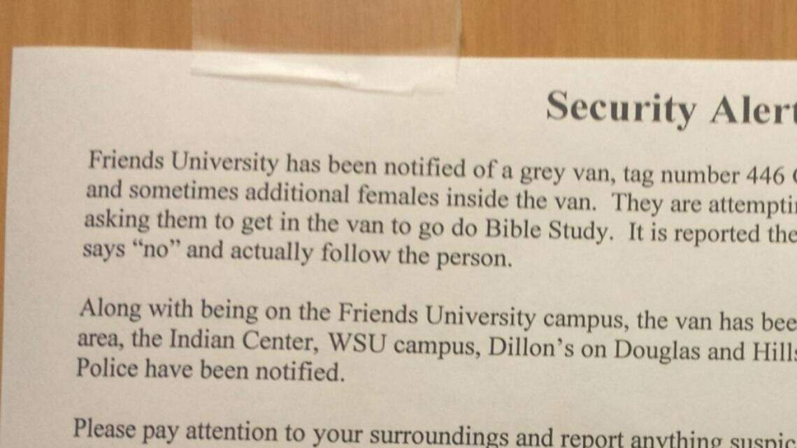 Notices were posted at Friends University on Saturday after students reported a gray van with individuals trying to lure them in for "Bible study." (Sept. 12, 2015)