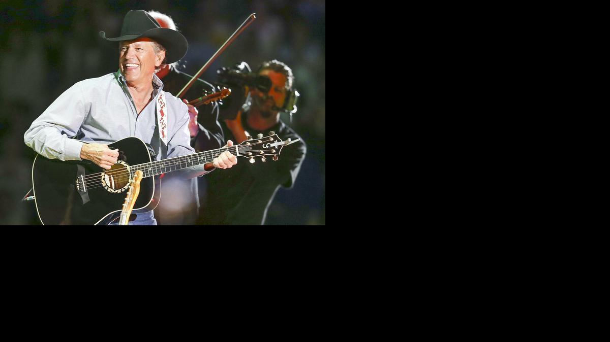 George Strait entertains the crowd at Intrust Bank Arena on Friday. (April 4, 2014)

