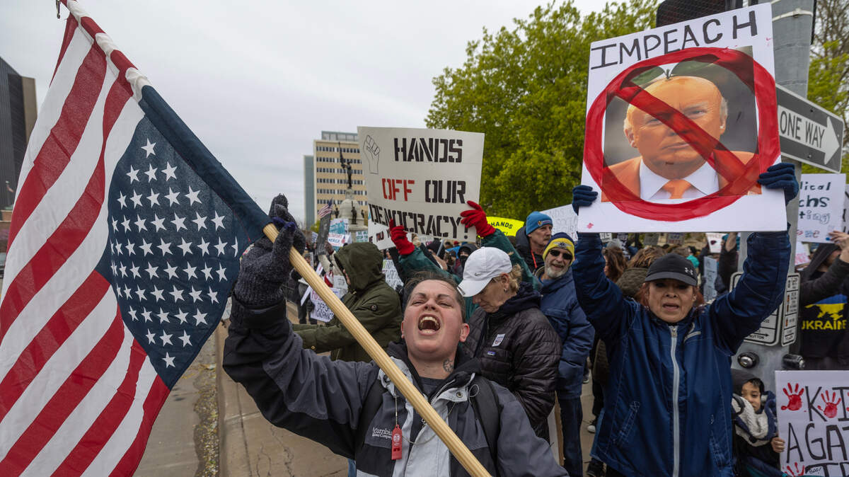 Despite cold weather, a huge crowd turned out for a protest of Trump administration polices in front of the Historic County Courthouse on Saturday. Similar protests were held around the country.
