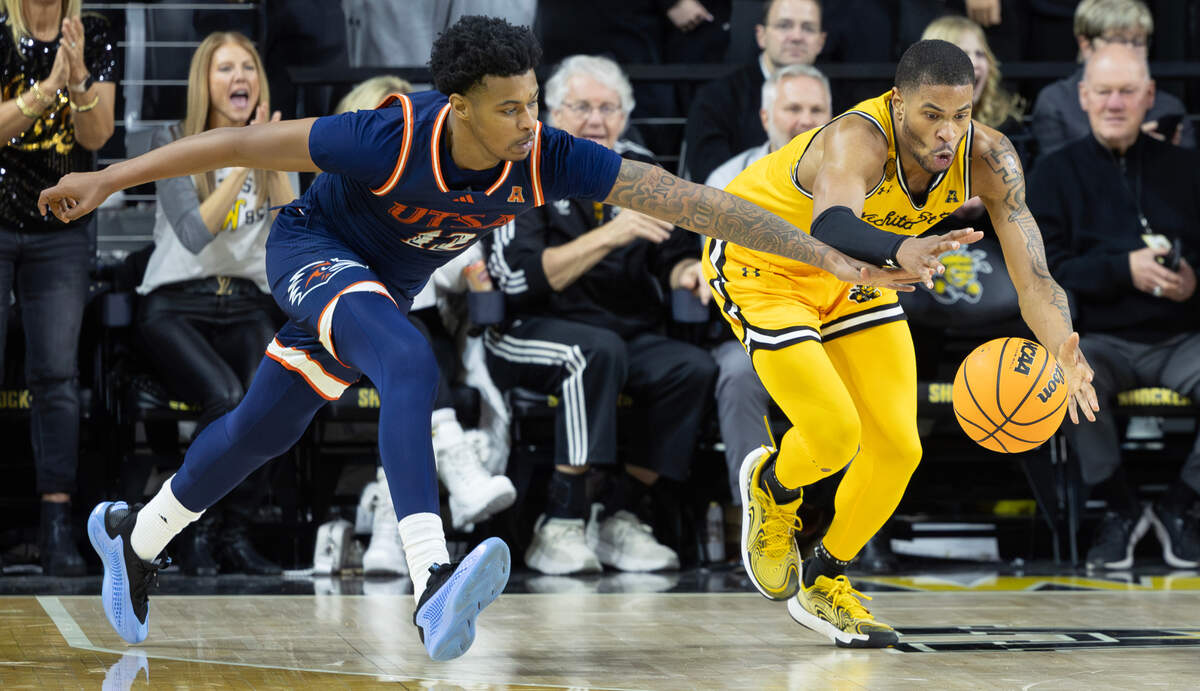 Corey Washington fights to secure a rebound during the second half of their game against UTSA on Wednesday night. 