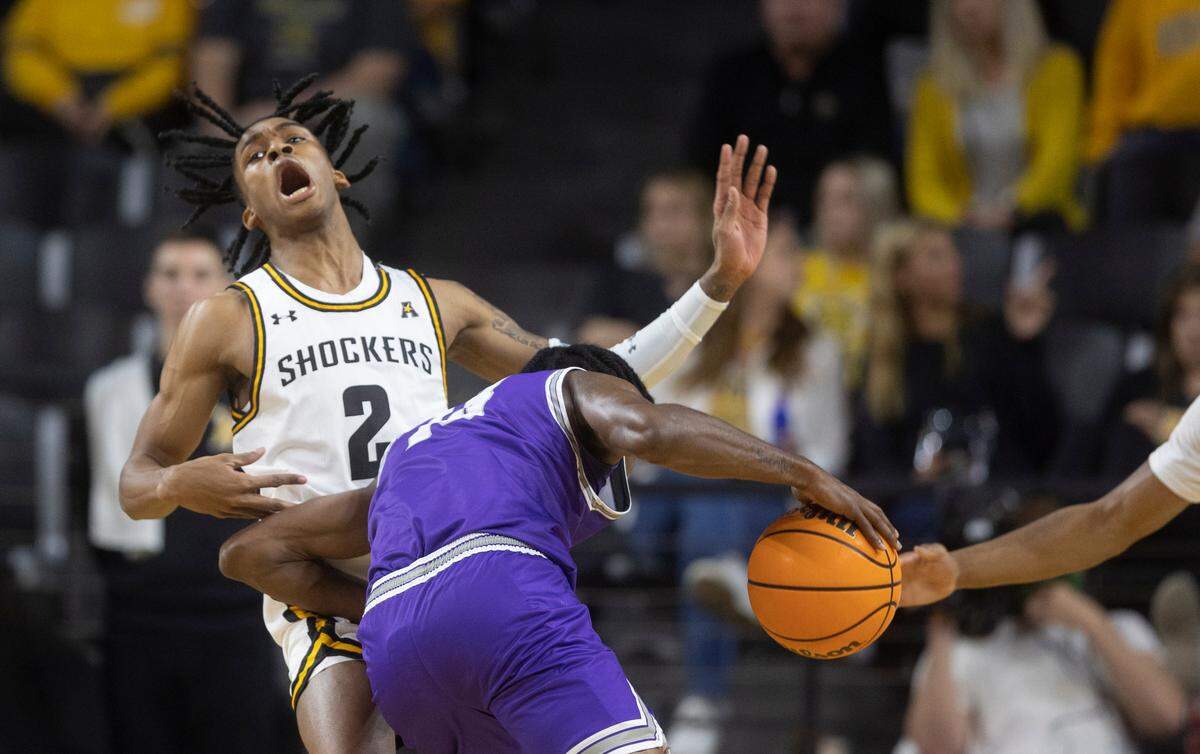Chaunce Jenkins picks up a charge during the first half against Tarleton State on Tuesday at Koch Arena.