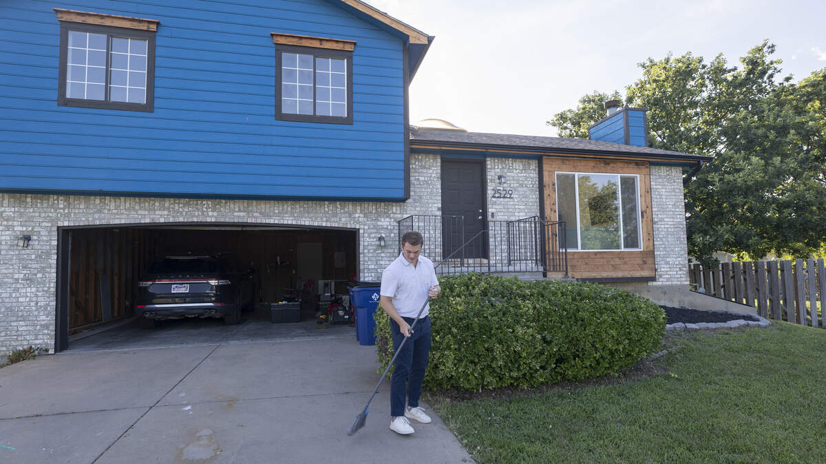 This house’s bright blue facade might have discouraged other potential buyers. But it’s become the east Wichita home of Alex and Natalie Beauchamp.