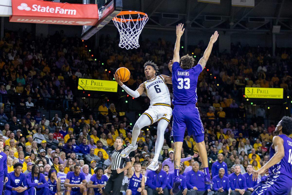 Wichita State forward Corey Washington attacks the basket in Saturday’s home game against K-State.