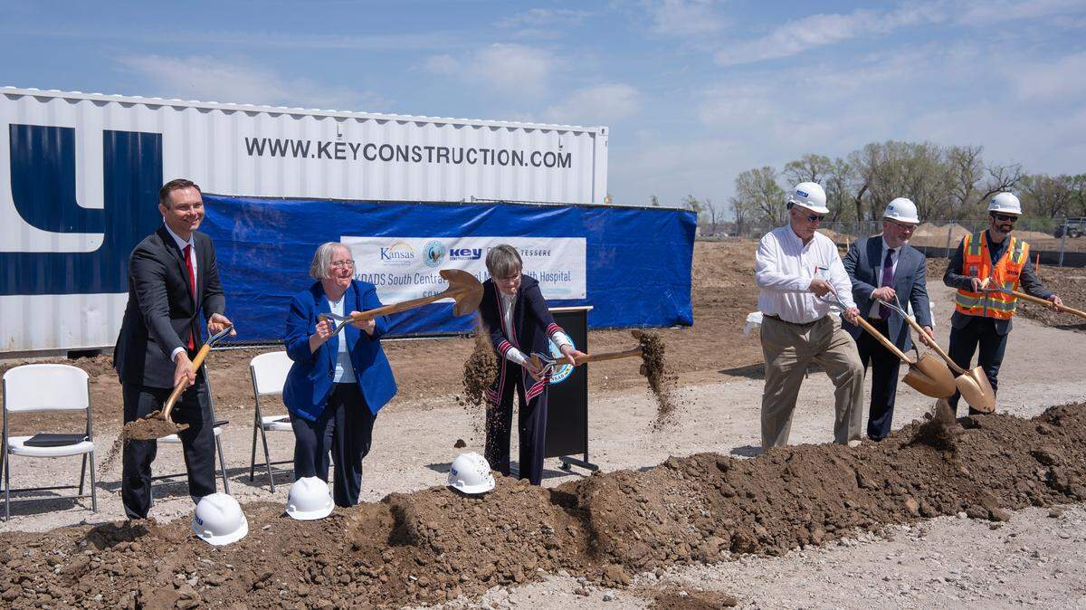 Lawmakers broke ground this afternoon on the South Central Kansas psychiatric hospital. Left to right, Sedgwick County Commissioner Ryan Baty, KDADS secretary Laura Howard, Gov. Laura Kelly and Lange Real Estate Managing Partner Jeff Lange.