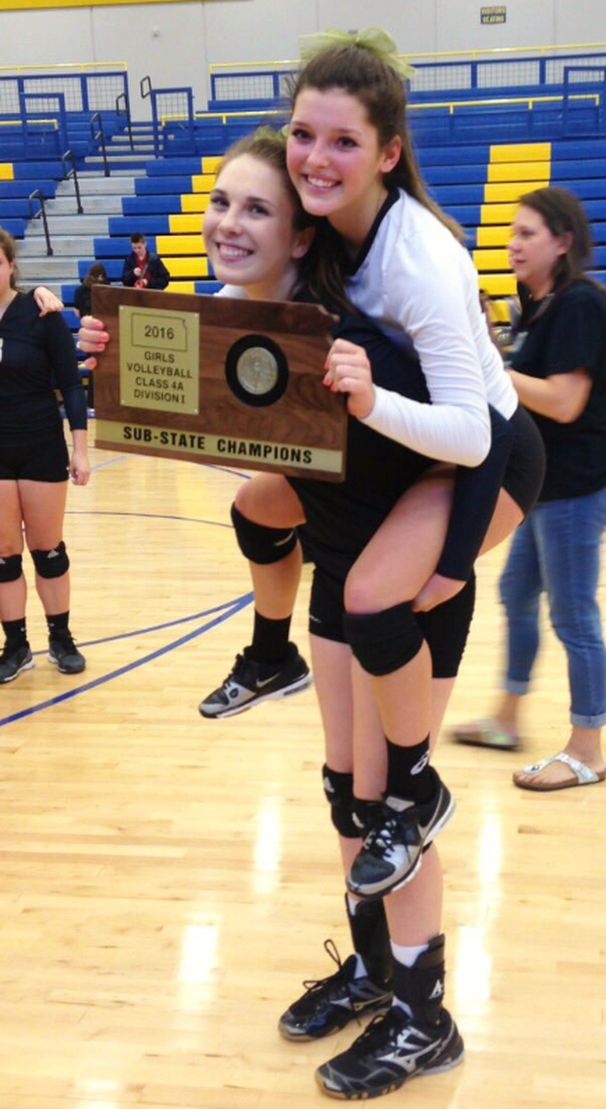 Andover Central’s Brooklyn Strobel  (right)