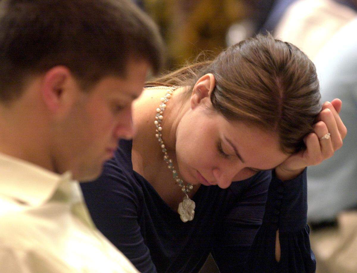 Lauren Ochs sat with her then-fiance, Jon Rolph, and prayed at the end of the 44th annual Wichita Prayer Breakfast. The married couple, who are now parents of six, have faced a number of obstacles in the last year as Jon Rolph recovered from a rare form of cancer. They say faith has helped them in their journey.