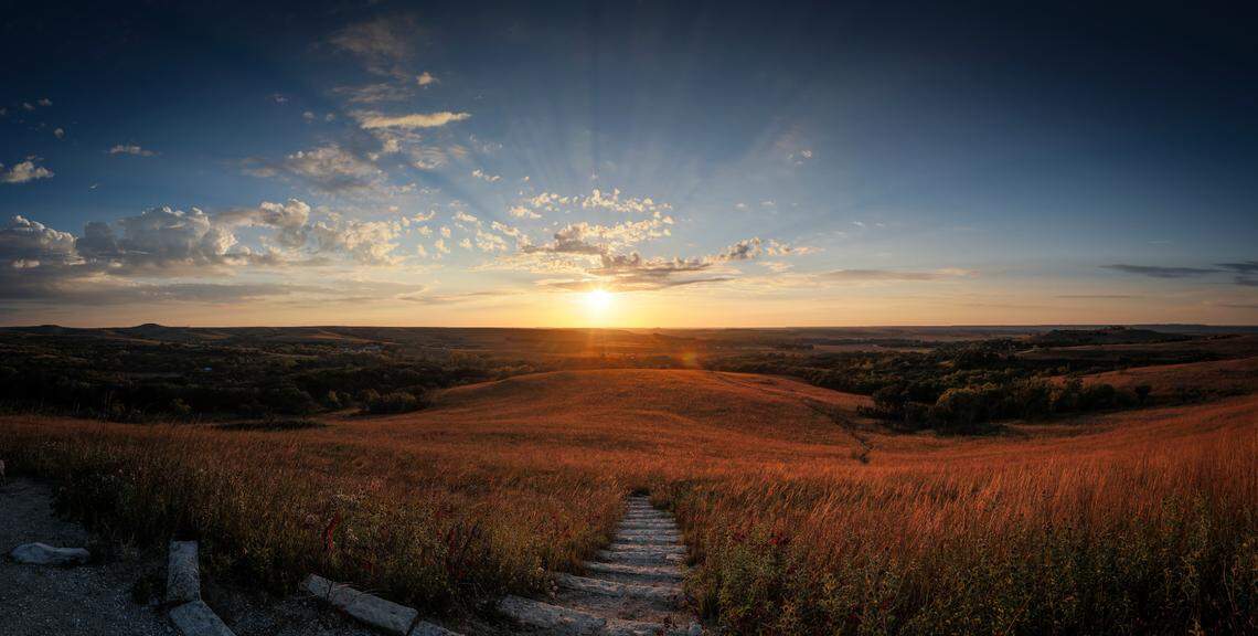 A setting sun can be seen from atop a hill at the Konza Prairie near Manhattan.