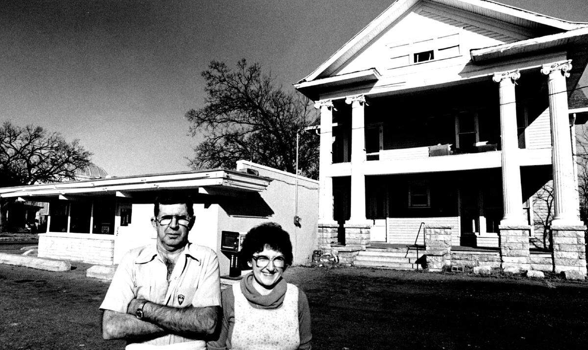 Bill and Mary Stratton are pictured in 1986 in front of their original Bill’s Big 6 burger restaurant and an 1883 era home at Murdock and Topeka that were both slated for demolition to make way for a St. Francis Regional Medical Center parking lot.
