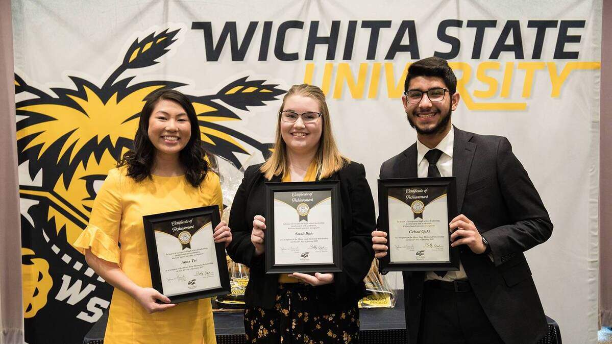 Three Wichita-area students, from left, Anna Tri, Sarah Buie and Gehad Qaki, each received WSU’s Harry Gore Memorial Scholarship on Friday, which is worth $64,000 toward their studies.