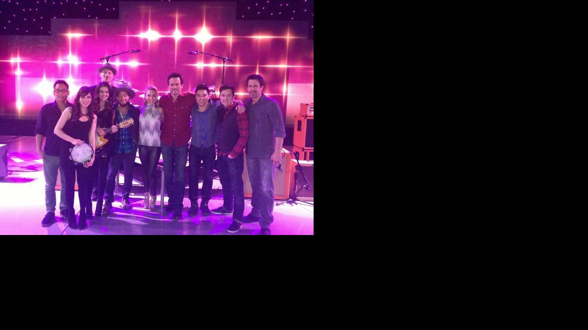 Matt Combs, back row, is pictured on the set of “Nashville” with many of the stars, including Hayden Panettiere, fifth from right, and Chip Esten, fourth from right. Combs is an on-screen musician and coach for the ABC show.

