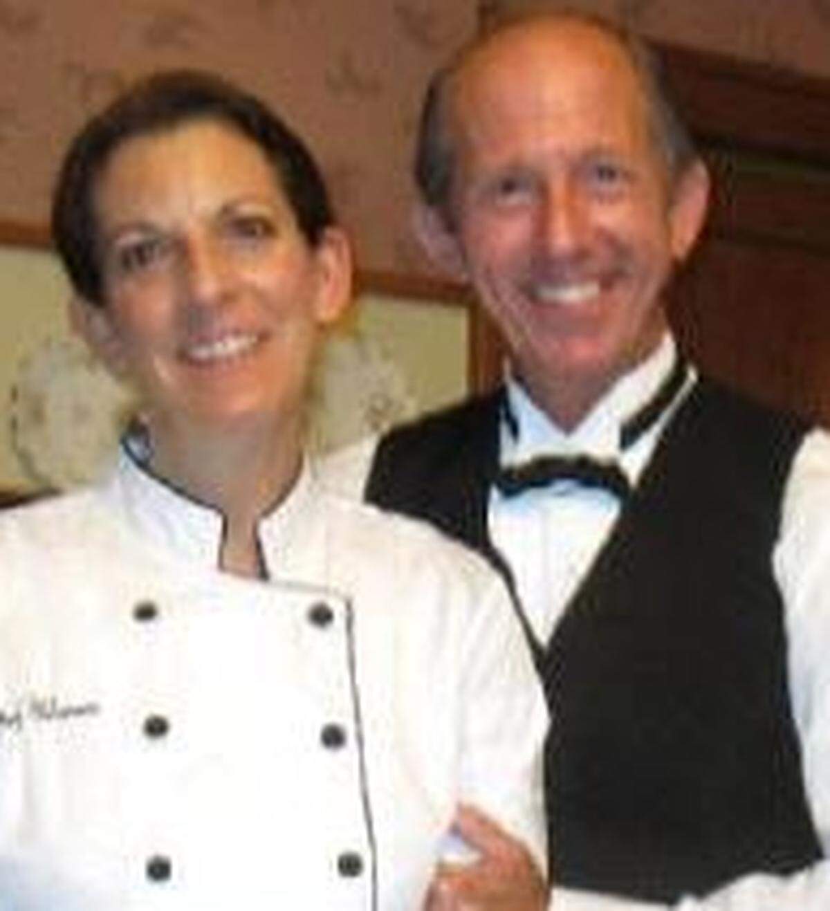 Adrian and Jay Porter dressed for an event at their inn.
