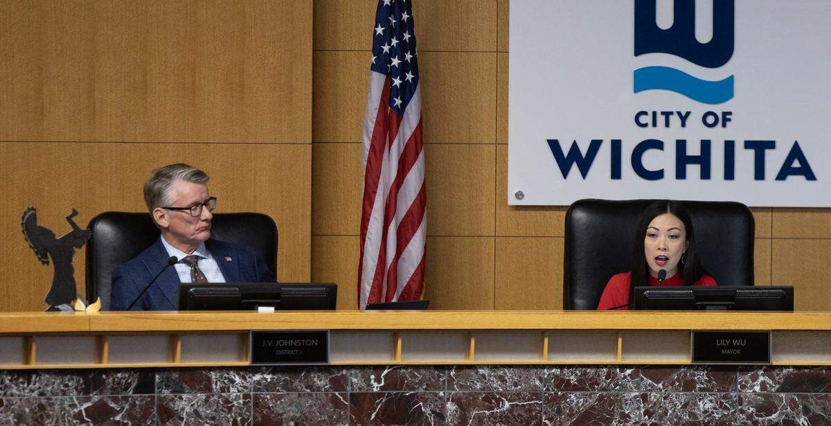District 5 City Council member J.V. Johnston listens to Mayor Lily Wu speak during the City Council meeting on Tuesday.