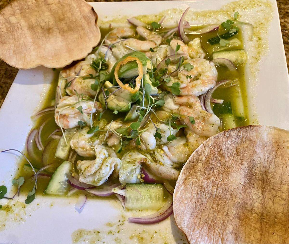 The spicy shrimp aguachiles, one of the new dishes on Molino’s shareable plates menu, is served cold and spicy.