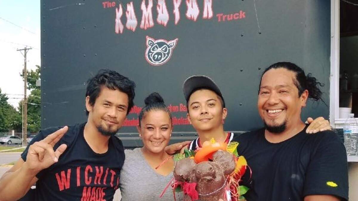 Alan Albarracin Jr., left, has closed his food truck after three years. It will be auctioned off on Wednesday.