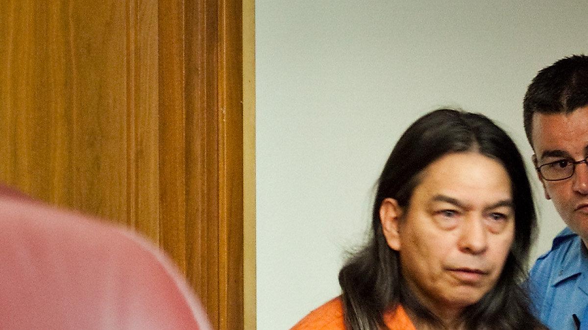 A Sedgwick County Sheriff Deputy directs Daniel U. Perez, 52, to his seat in District Court Tuesday, May 29, 2012. Perez has been charged with premeditated first-degree murder in the death of Patricia Hughes, 26. Prosecutors are giving evidence during Perez's preliminary hearing Tuesday to justify a murder trial for the commune leader accused of killing Hughes, whose 2003 death was initially believed to be an accidental drowning.