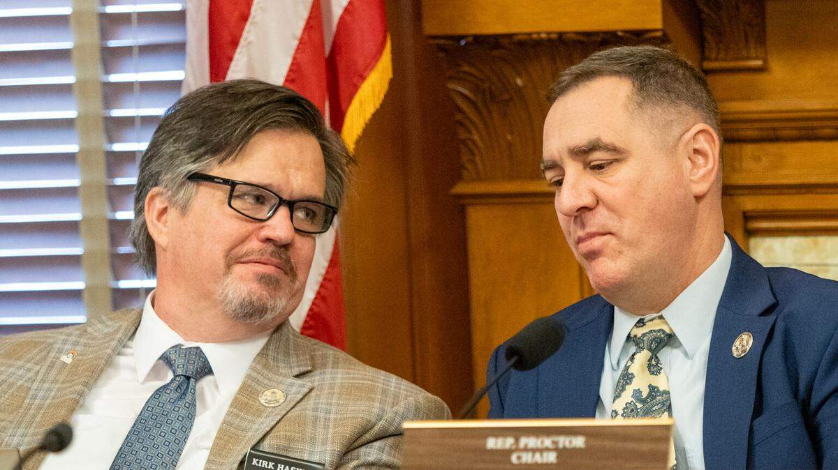 Reps. Kirk Haskins, a Topeka Democrat, and Pat Proctor, a Leavenworth Republican, sit together on the House Elections Committee on Jan. 27, 2026, in Topeka. The two are on opposing sides of a package of elections bills.