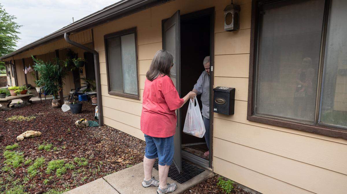 A volunteer driver for Meals on Wheels delivers a pre-packaged meal to a client. It’s one of the programs Jackson County would support with a new tax on the ballot.