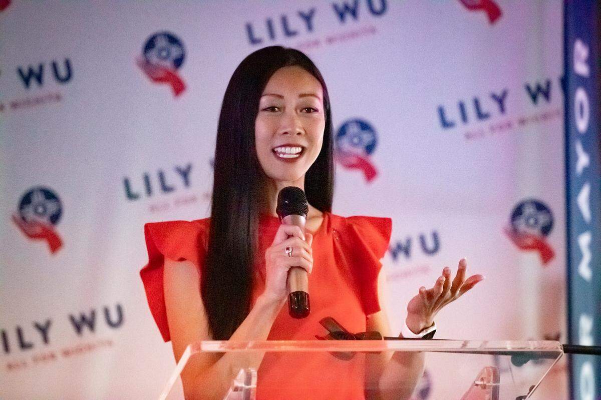 Lily Wu comes out to greet her supporters briefly at Dōma in Wichita on Tuesday night.