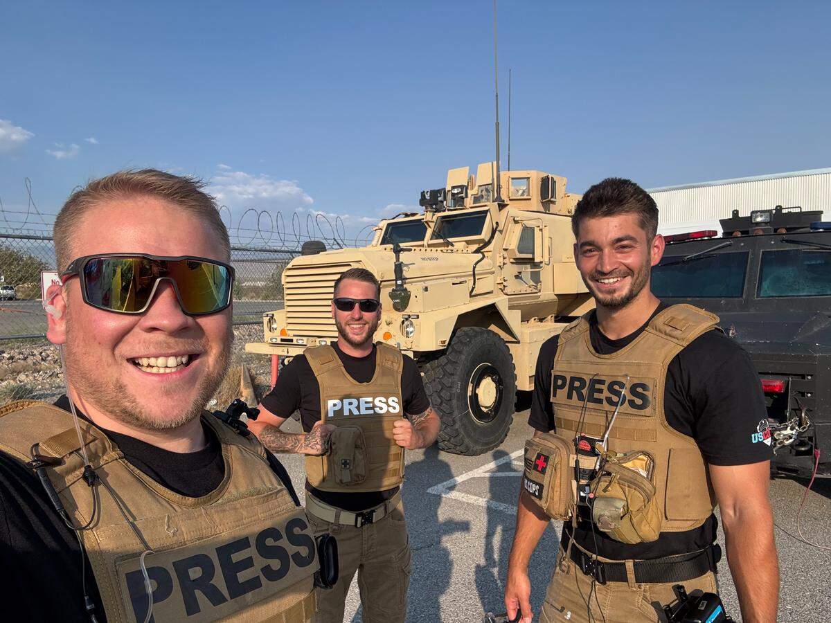 Benjamin Rambaum, chief editor Amadeus Asenhuber and cameraman Eric Nosty smile for a photo while filming for the FIRST RESPONDERS YouTube channel. The group recently wrapped up filming season 4 of their YouTube show, US COPS, in Wichita.