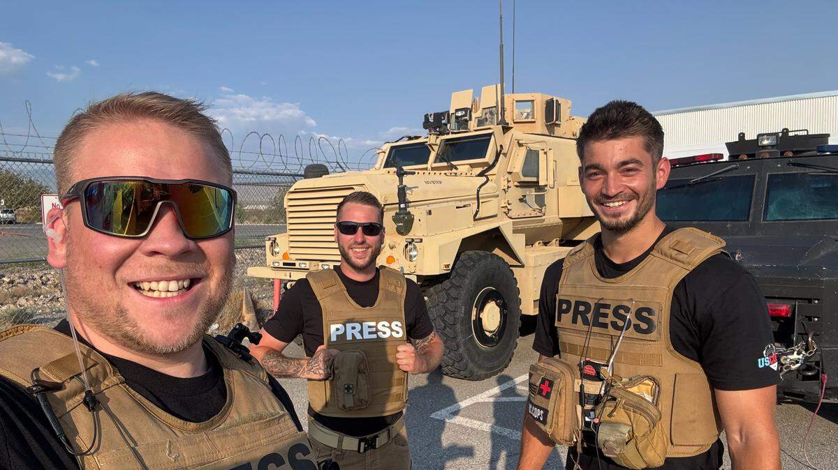 Benjamin Rambaum, chief editor Amadeus Asenhuber and cameraman Eric Nosty smile for a photo while filming for the FIRST RESPONDERS YouTube channel. The group recently wrapped up filming season 4 of their YouTube show, US COPS, in Wichita.