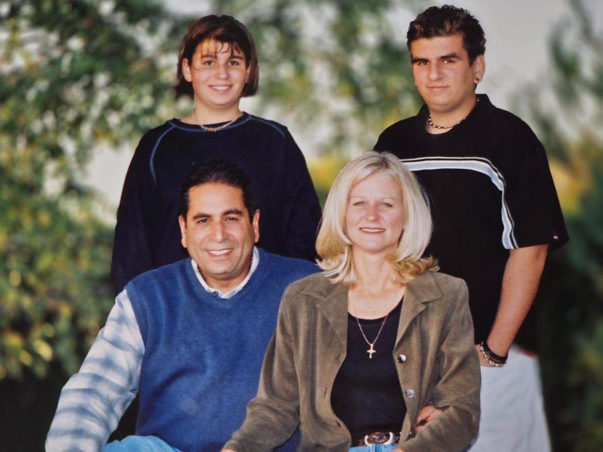 The late Barry Ellis with his wife, Jonna, and their children, from back left, Kasey and Spencer.