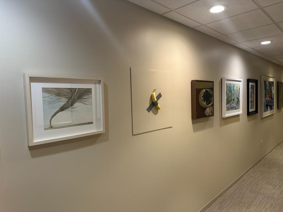 Bankers generally aren’t known for being pranksters&nbsp;— and Emprise Bank’s Mike Michaelis usually is far from it&nbsp;— but he did have some artistic fun recently with the banana art pictured second from the left on this gallery wall.
