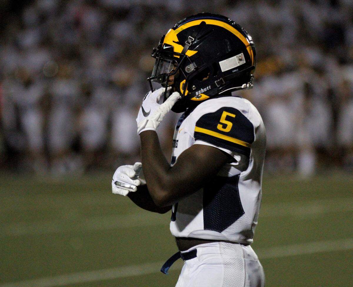 Wichita Northwest running back Roy Johnson gets set to field a punt against Bishop Carroll during the Grizzlies 23-22 win over the Golden Eagles on Friday night. (Aug. 31, 2018)
