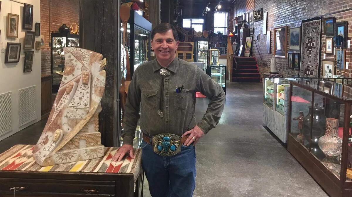 Richard Gottsponer, pictured, and his wife, Julie, are moving their Sandbar Trading to the east side. It’s been downtown for two decades. Pictured is their former Commerce Street space.