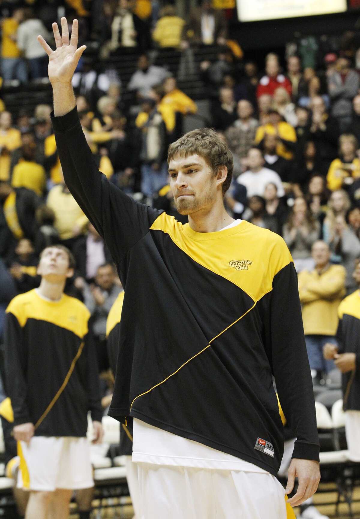 WSU’s Garrett Stutz acknowledges the crowd after being honored for scoring 1,000 points at Koch Arena Wednesday night. (Feb. 8, 2012)