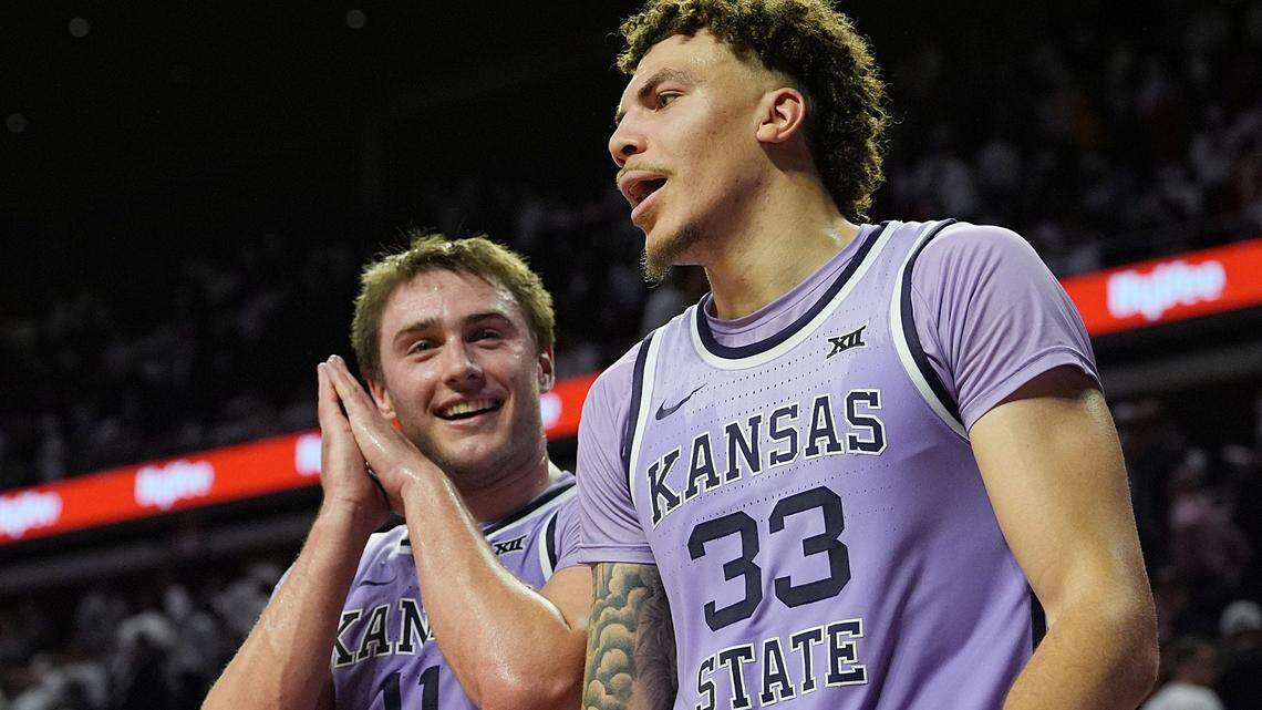 Kansas State Wildcats’ guard Brendan Hausen (11) and forward Coleman Hawkins (33) celebrates after winning 61-80 over Iowa State in the Big-12 men’s basketball showdown at Hilton Coliseum on Feb 1, 2025 in Ames, Iowa.