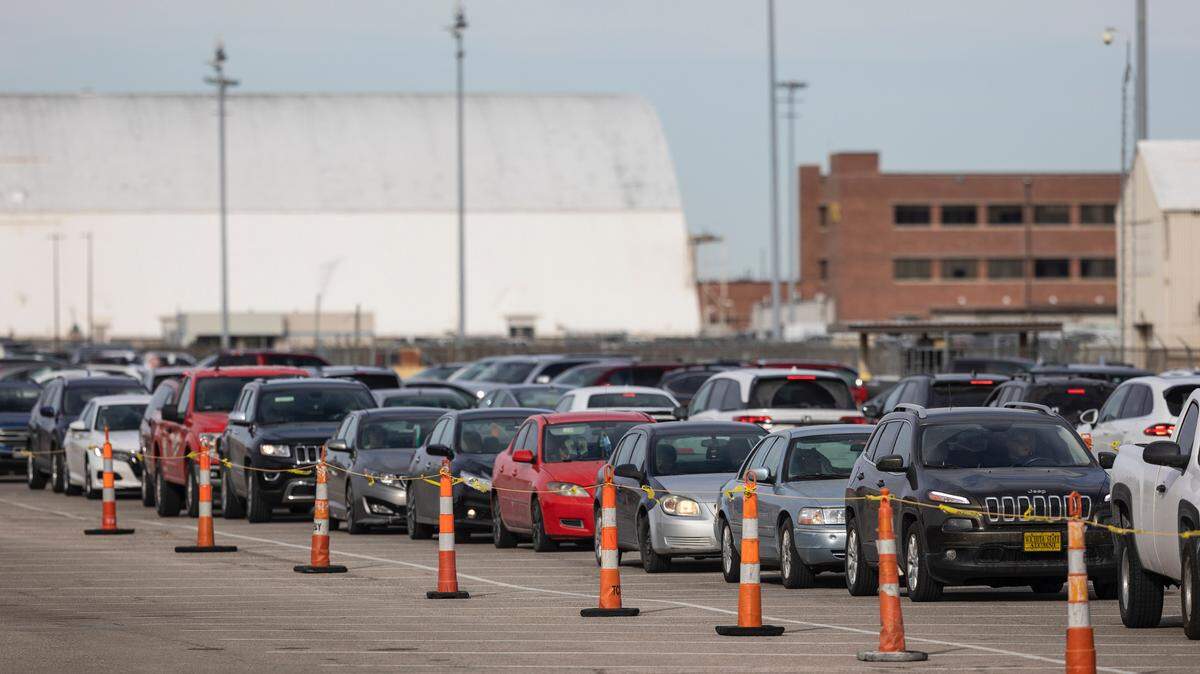 Nearly 100 cars wait in line for their occupants to get a COVID test at Wichita State University’s Molecular Diagnostics Laboratory at 4174 S. Oliver, Building 174H near Spirit AeroSystems on Tuesday, Jan. 4, 2022. There is no appointment needed but all patients need to be registered through the Molecular Diagnostics Laboratory’s patient portal. It’s open Monday through Friday 6 a.m. until 6 p.m. Call 316-978-8600 for more information.
