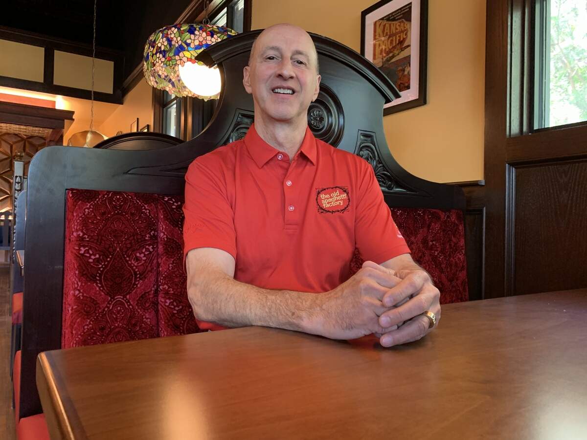 Chris Dussin, whose parents founded The Old Spaghetti Factor in 1969, has been in town preparing for the Wichita restaurant’s opening.