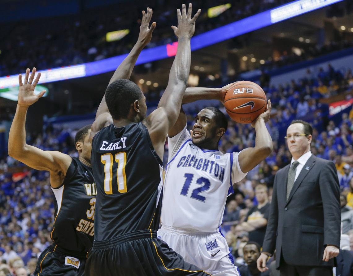 Wichita State’s Tekele Cotton, left, and Cleanthony Early apply defense to Creighton’s Jahenns Manigat towards the end of the Missouri Valley final on Sunday. (March 10, 2013)