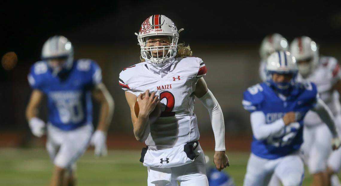 Maize quarterback Avery Johnson runs for a long touchdown during the first half of their game against Kapaun Mt. Carmel on Friday. Maize won 22-21 to earn a spot in next week’s 5A state championship game.