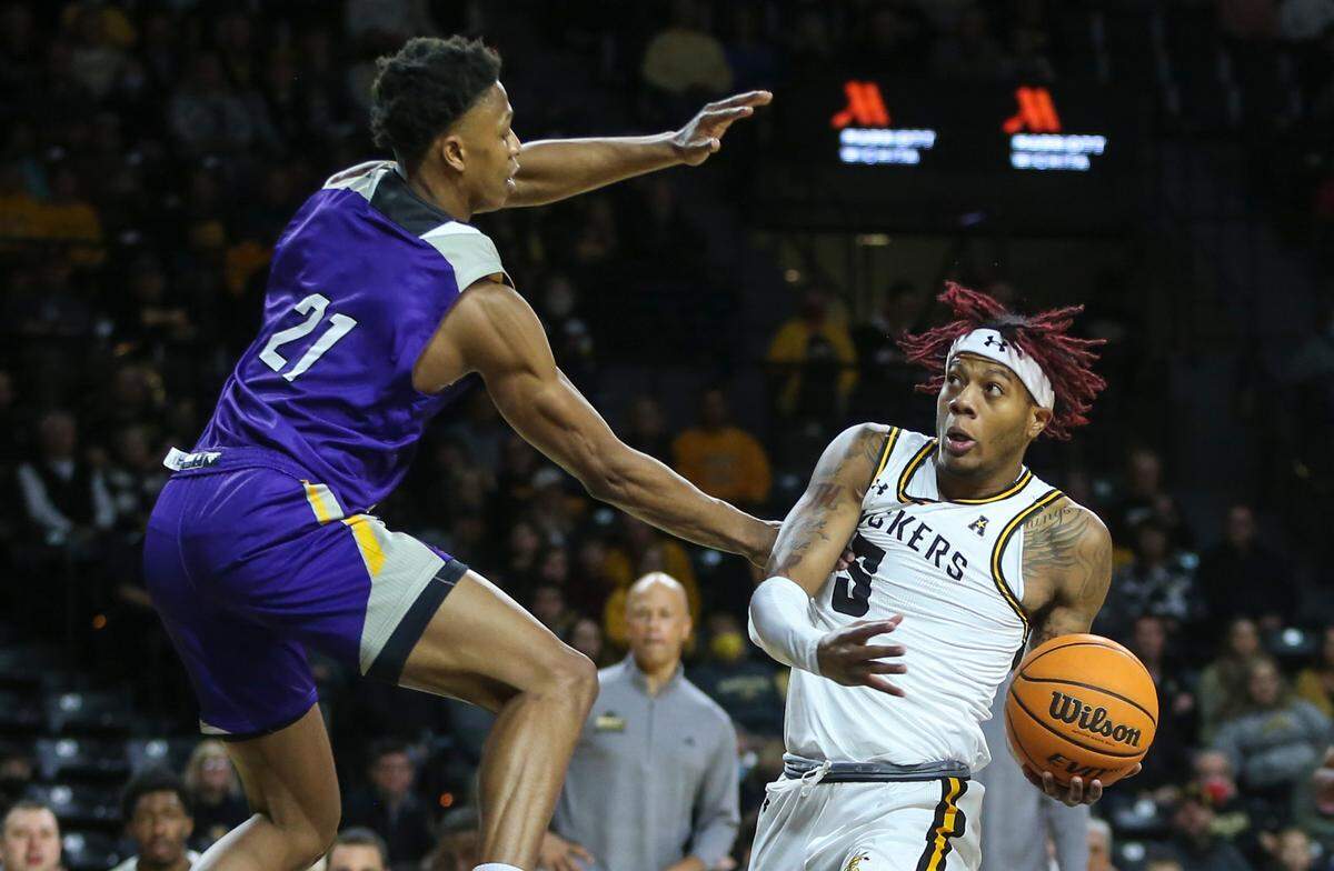 Wichita StateÕs Monzy Jackson is fouled while going to the basket during the first half of their game against Prairie View A&M on Wednesday night at Koch Arena.