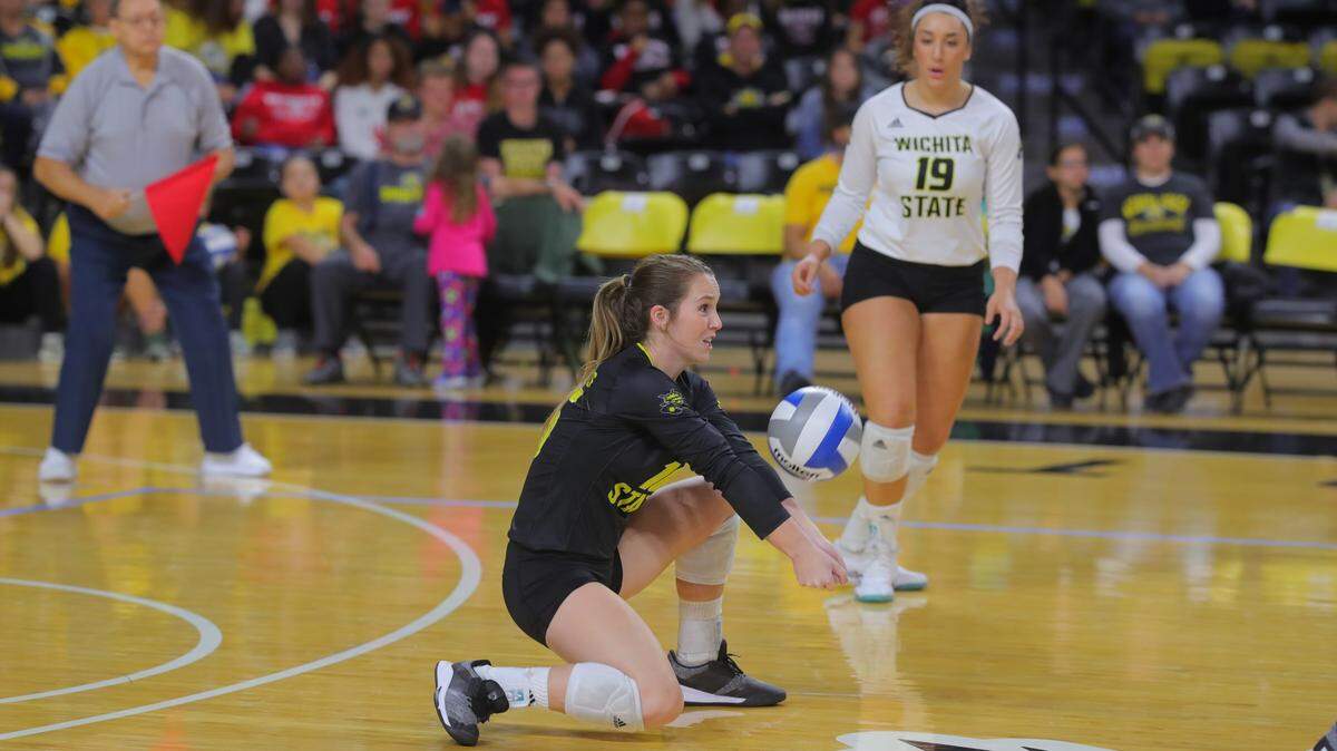 Junior Kara Bown (center) has provided a much-needed boost to Wichita State’s back-row defense in support of libero Giorgia Civita (background).
