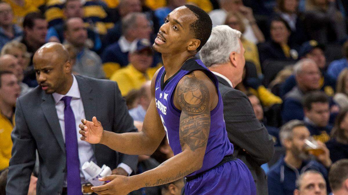 Kansas State guard Barry Brown Jr. reacts after being called with a foul against Marquette during the first half of an  NCAA college basketball game Saturday, Dec. 1, 2018, in Milwaukee. (AP Photo/Darren Hauck)