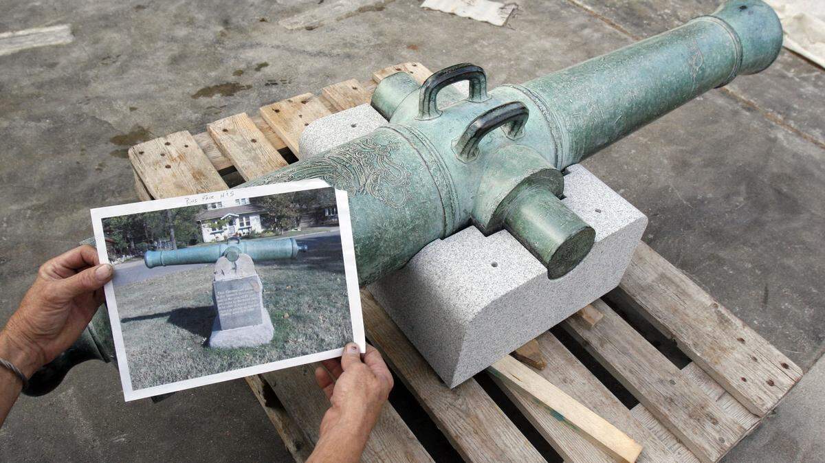 This archive photo shows the Spanish American War cannon after it was restored in 2007. The picture within the photo is of the cannon before it was restored.