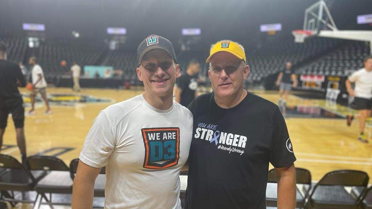 West athletic director David Clark, a die-hard Wichita State fan, will be on the visitor’s bench for Friday’s TBT game between the AfterShocks and We Are D3 at Koch Arena. Clark (right) and We Are D3 coach Michael Rejniak (left) have formed an unlikely pairing this summer.
