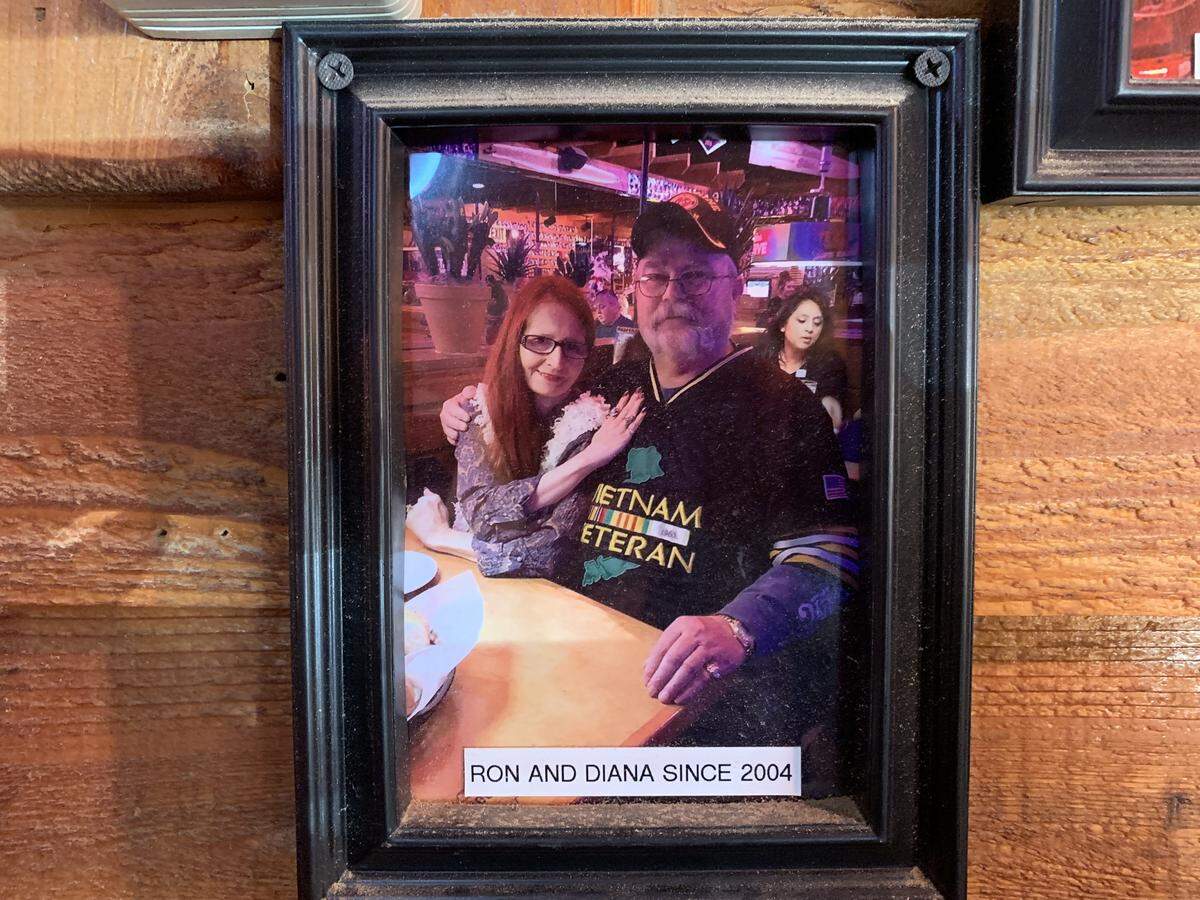 Diana and Ron Watson have their photo on the regular customer wall of fame at Texas Roadhouse West in Wichita.