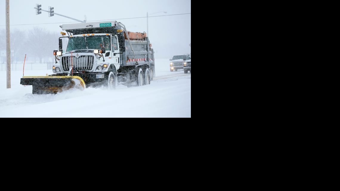A Wichita city snowplow works its way north on Meridian on Feb. 4 near 37th Street. Several inches of snow blanketed the area. 

