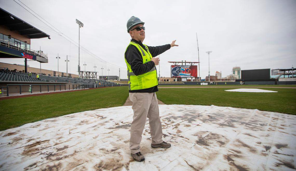 Lou Schwechheimer, the owner of the Wichita Wind Surge, stands near home plate in the team’s new ballpark and talks about the finishing stages of construction.
