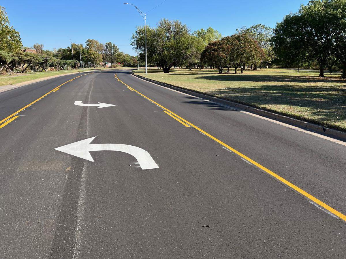 A turn arrow on McLean between Central and 13th points straight into the Arkansas River.