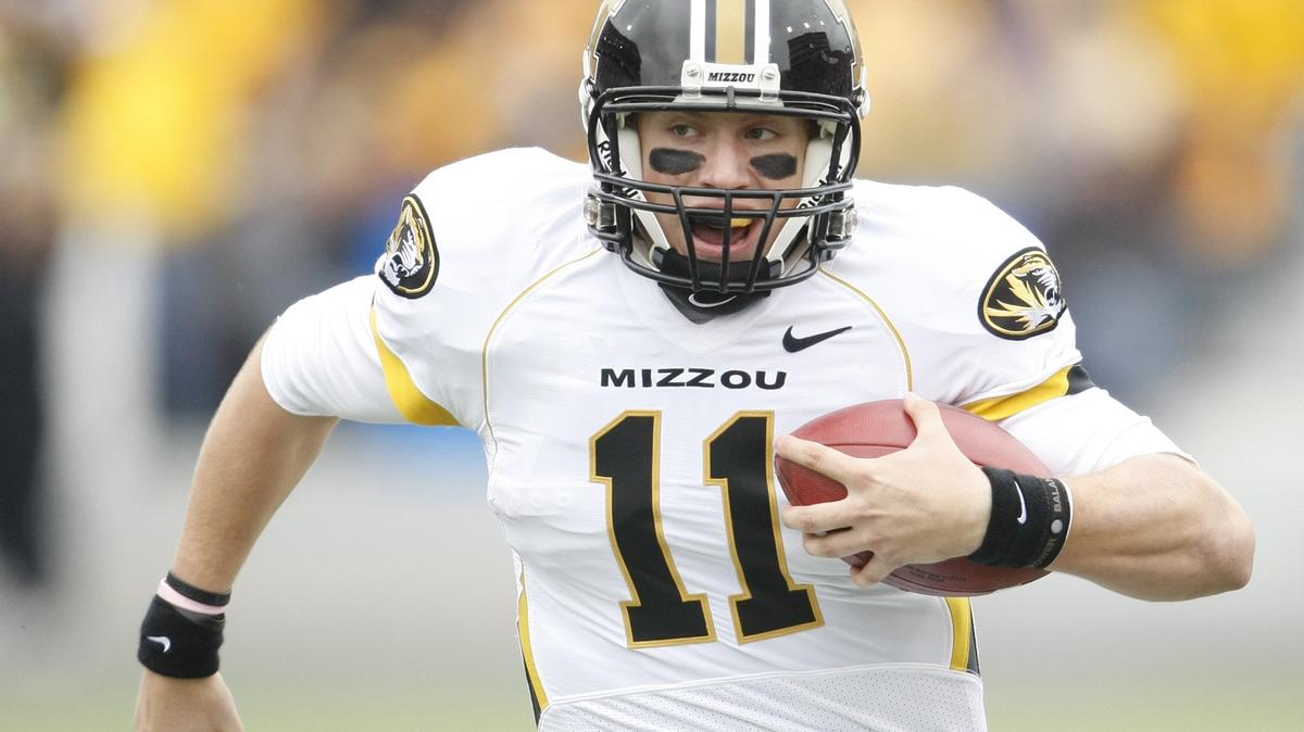 Missouri quarterback Blaine Gabbert looks for an opening as he scrambles for yards in Manhattan. Gabbert had 35 yards rushing and was 20 of 27 passing for 298 yards.
