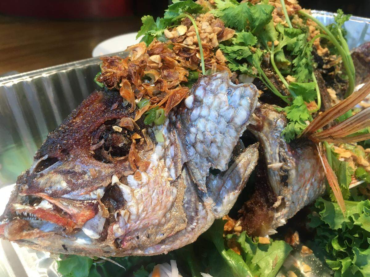 A lot of people would prefer not to eat a fish with its head still on, but this was just one of many amazing, adventurous dishes our friend Danny Nguyen concocted for us at Lemongrass in Old Town Square.