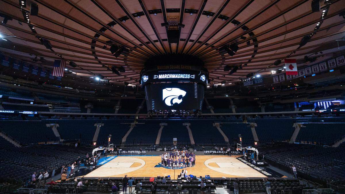 Kansas State players meet at center court of Madison Square Garden on Wednesday for practice. The Wildcats will take on Michigan State in the east region semifinal on Thursday.